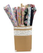 Haberdashery Shop Stock: Various rolls of chintz and patterned rolls of fabric including a towelled