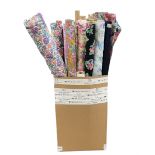 Haberdashery Shop Stock: Various rolls of chintz and patterned rolls of fabric including a towelled