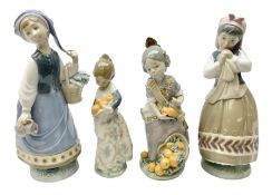Four Lladro figures