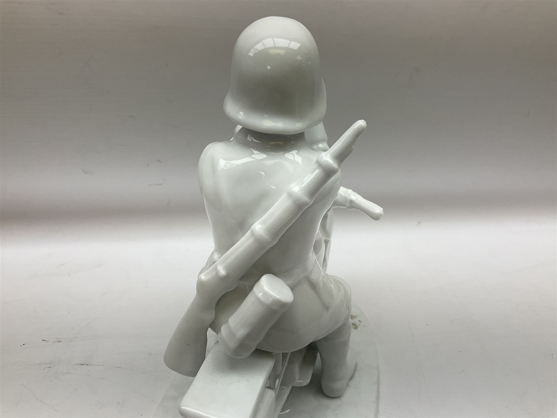 Neundorf figure modelled as a soldier seated upon a stationary motorcycle looking through binoculars - Image 2 of 8