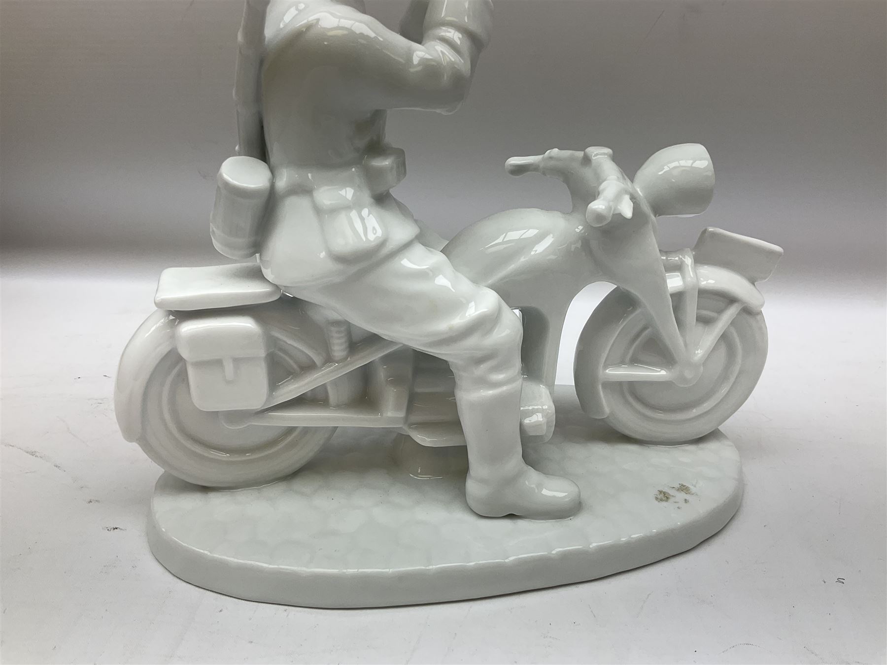 Neundorf figure modelled as a soldier seated upon a stationary motorcycle looking through binoculars - Image 4 of 8