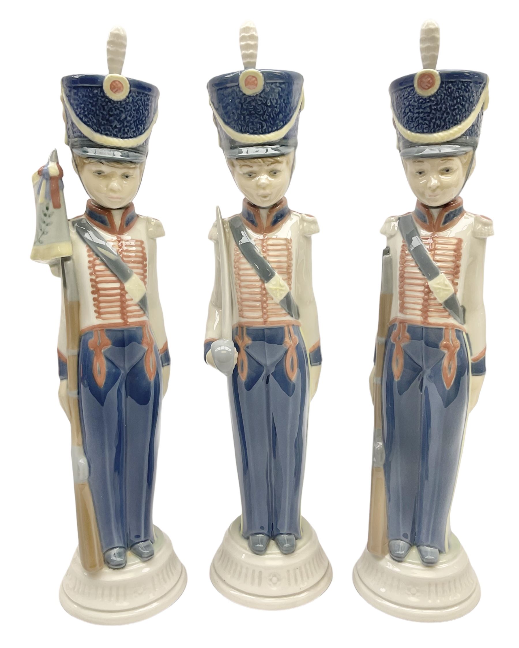 Three Lladro soldier figures