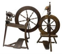 Two vintage beech spinning wheels