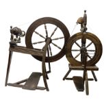 Two vintage beech spinning wheels