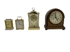 Three quartz mantle clocks and one 1930s mantle clock