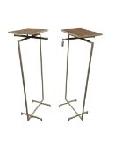 Pair of contemporary shops display clothes rails
