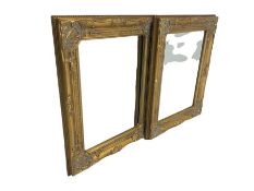 Pair of small gold finish classical wall mirrors