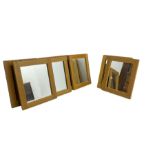 Ten oak framed rectangular mirrors