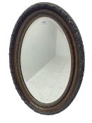 Early to mid-20th century oval wall mirror