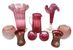 Group of cranberry glass