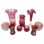 Group of cranberry glass