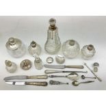 Group of glass silver collared and lidded jars