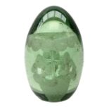 Victorian green glass dump paperweight with flower inclusions