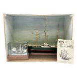 Boat model in box and another smaller in glazed diorama