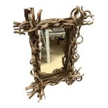 Mirror with a rootwood frame