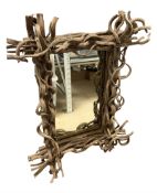 Mirror with a rootwood frame