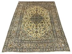 Persian Kashan golden ivory ground carpet