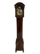 Georgian style late 20th century Grandmother clock in a figured mahogany veneered case with a Westmi