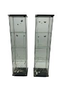 Two four sided glass display cabinets