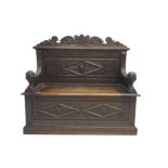 Late 19th century heavily carved oak monks bench
