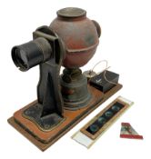 Ernst Plank Germany toy tin-plate fixed lens magic lantern of globular form with original burner and