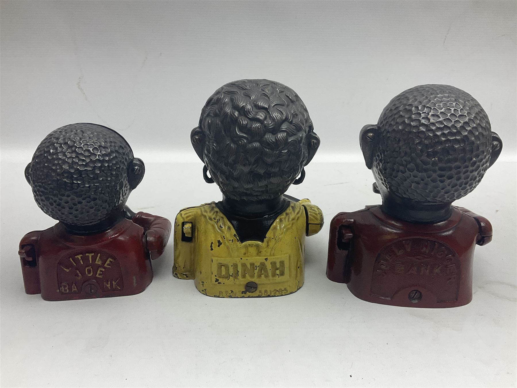 Three early 20th century cast-iron mechanical money banks as a family group comprising mother 'Dinah - Image 2 of 10