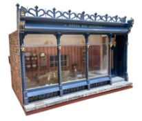 Good quality late 20th century dolls house by M. James dated 1995 in the form of a Beverley East Yor