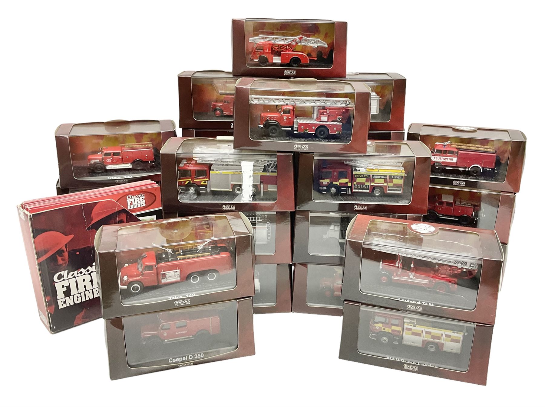 Twenty-six Atlas Editions Classic Fire Engine series die-cast models