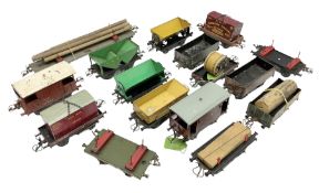 Hornby '0' gauge - sixteen unboxed and playworn goods wagons including bogeyed log carrier