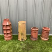 Set of four terracotta chimney pots