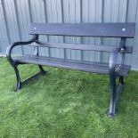 Cast iron and wood slate garden bench painted in black