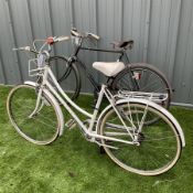 Pair of Raleigh vintage mens and ladies bikes