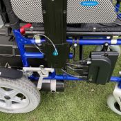 Enigma Energi Wheeltech Electric powerchair with manual and charger