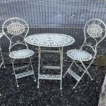 Pale green oval folding metal garden table