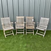 Set four teak slatted folding garden armchairs
