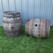 Two metal bound Whiskey barrels