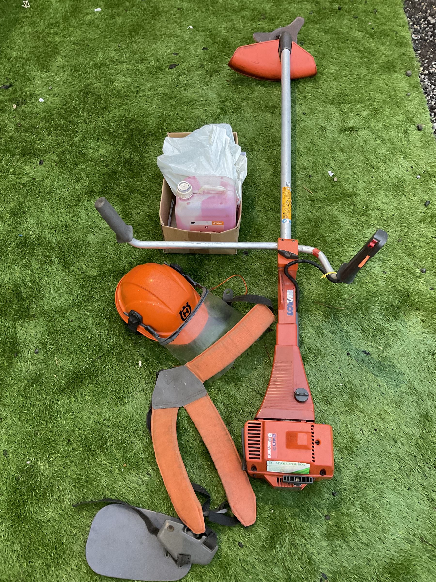 Husqvarna 240 R petrol strimmer with harness and helmet