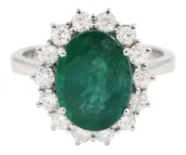 18ct white gold oval emerald and diamond cluster ring