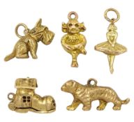 Five 9ct gold charms including Lincoln Imp