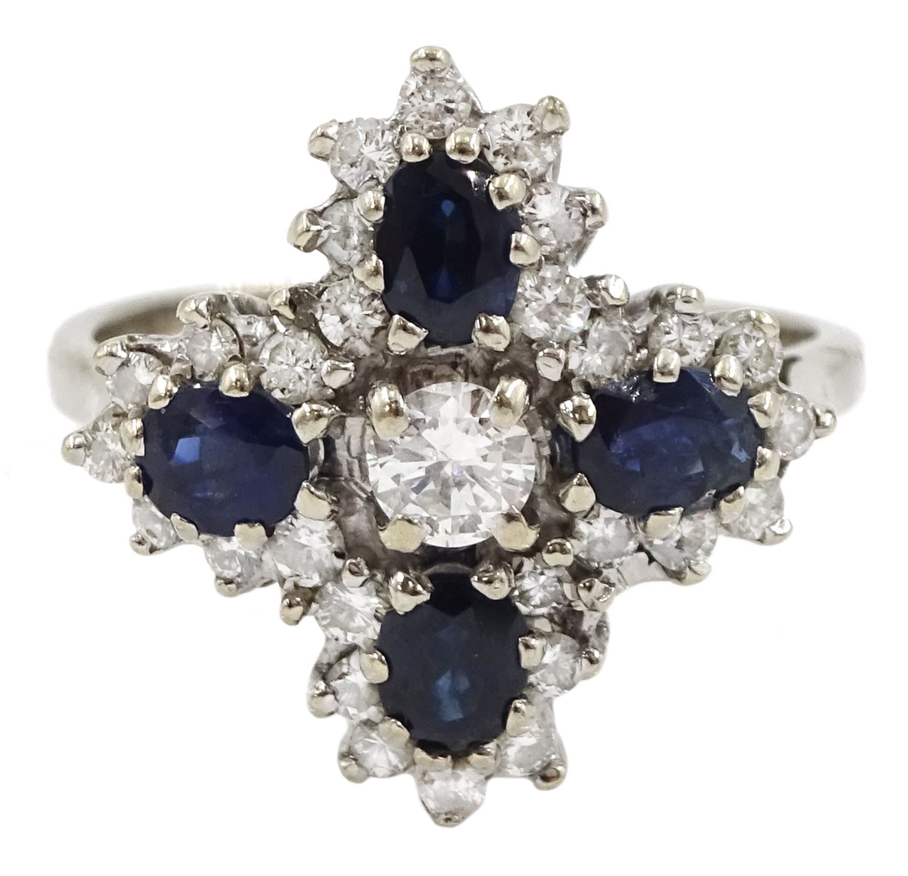 White gold oval sapphire and round brilliant cut diamond cluster ring