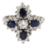 White gold oval sapphire and round brilliant cut diamond cluster ring