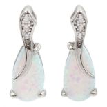 Pair of silver pear shaped opal and cubic zirconia stud earrings