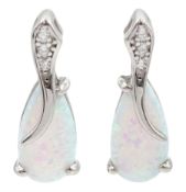 Pair of silver pear shaped opal and cubic zirconia stud earrings