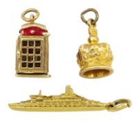 Three 9ct gold charms including telephone box