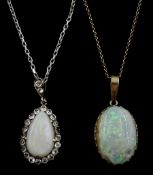 Gold pear shaped opal and clear paste stone pendant