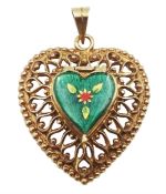 Gold openwork heart pendant with enamel flower locket centre