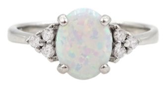 Silver single stone opal and cubic zirconia cluster ring