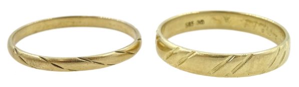 14ct gold wedding band and an 8ct gold wedding band