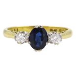 18ct gold three stone oval sapphire and round brilliant cut diamond ring