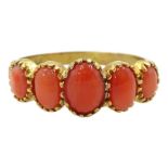 Silver-gilt five stone graduating coral ring